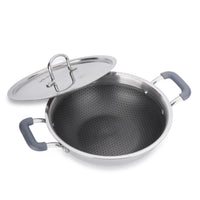 Stainless steel wok with gray handles and a lid on a white background