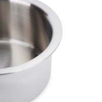 Close-up of a stainless steel bowl on a white background
